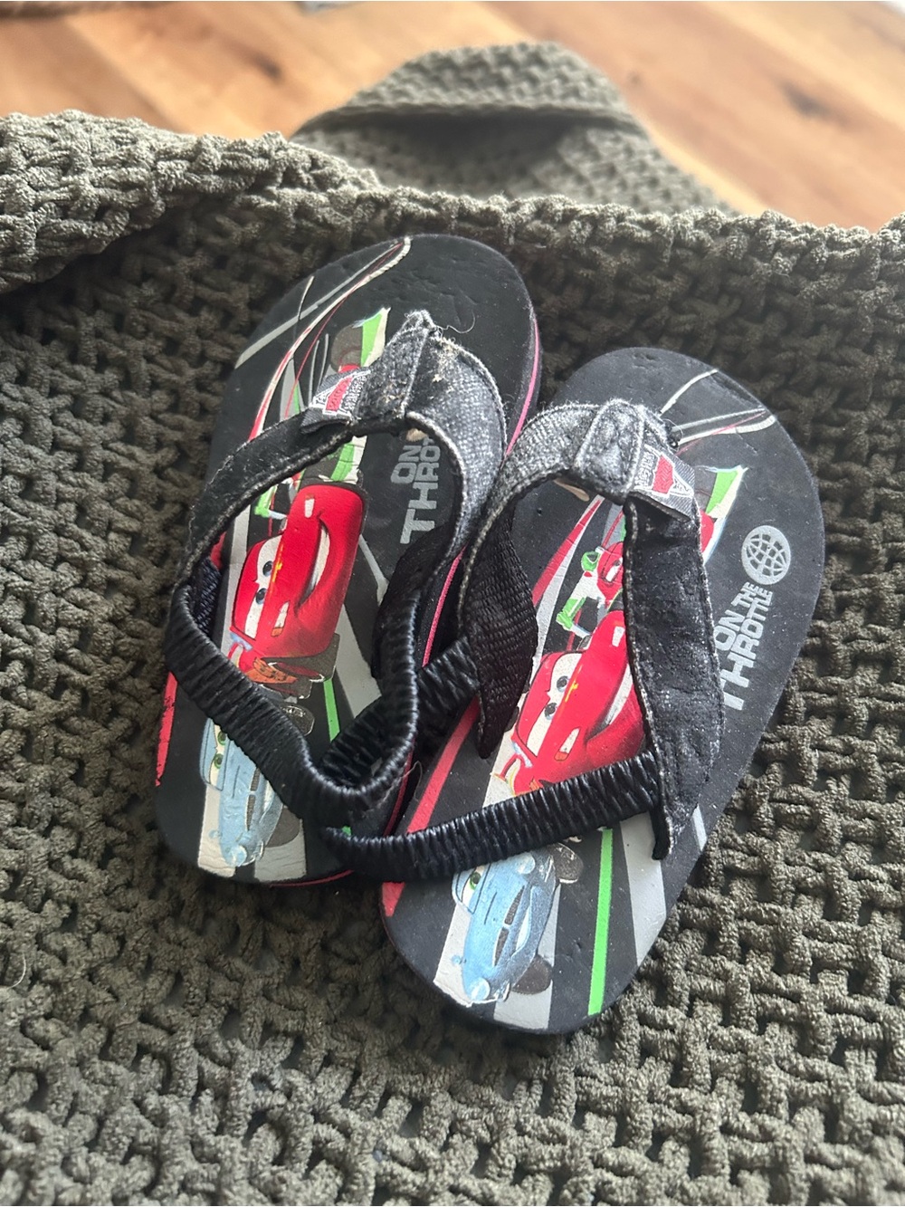 Kids' Black Flip Flop Sandals with Red & Blue Race Car Print